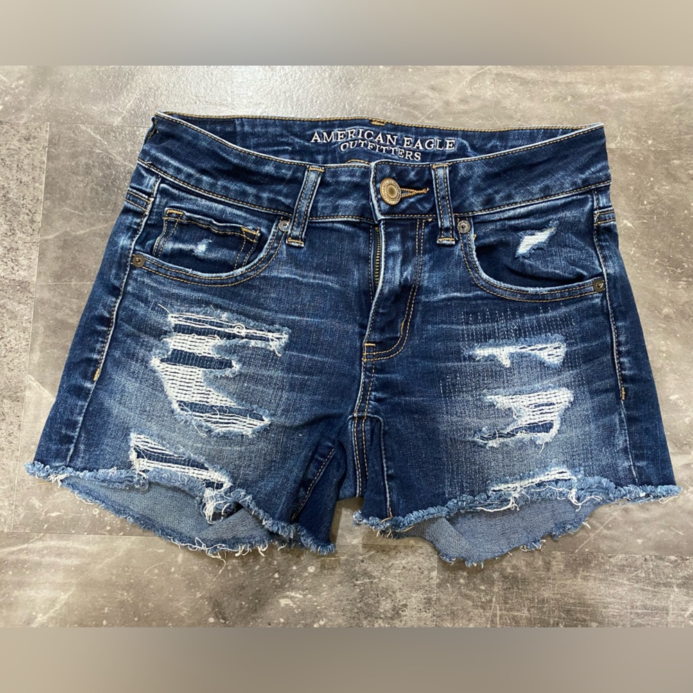 American Eagle dark wash distressed midi short
